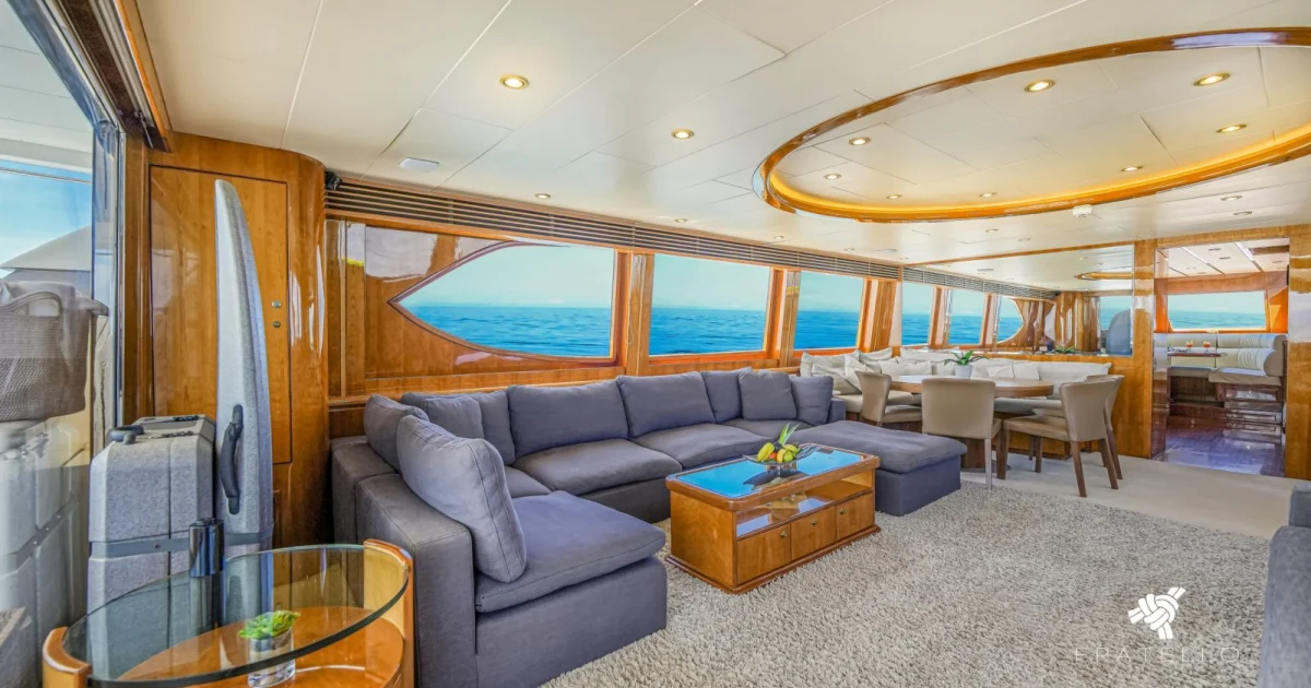 Wood-paneled main salon of the Montefino 84 luxury yacht, a superyacht charter from La Cruz near Puerto Vallarta